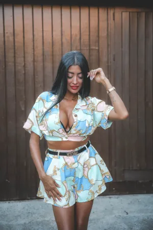 Maya wearing a flowery dress